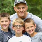 dad and 3 sons at Father Son Adventure Weekend at Deer Run Camps & Retreats