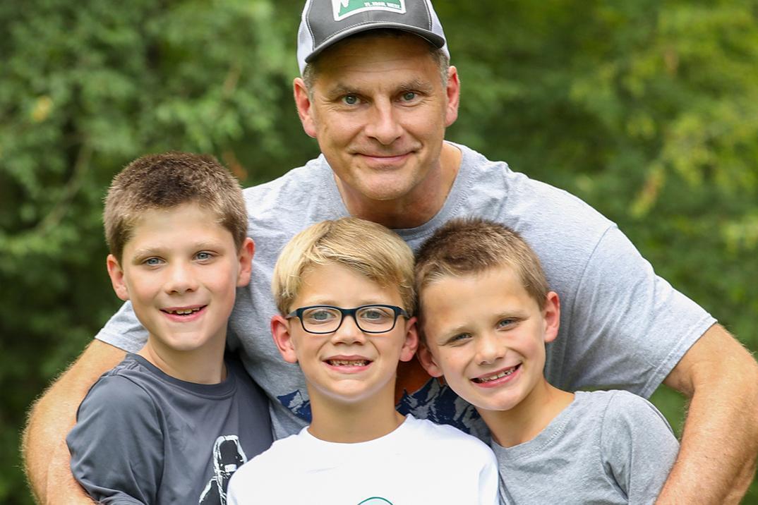 dad and 3 sons at Father Son Adventure Weekend at Deer Run Camps & Retreats