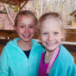 girls under the carpetball pavilion at Deer Run Spring Break Day Camp