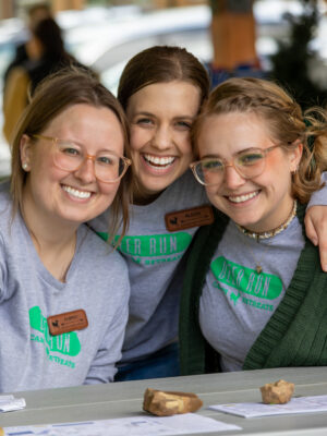 Full time Deer Run Camps & Retreats staff smiling for a photo at the annual Family Day event.