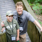 Father and Son enjoying Deer Run Camps & Retreats Father Son Adventure Weekend Camp.