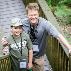 Father and Son enjoying Deer Run Camps & Retreats Father Son Adventure Weekend Camp.