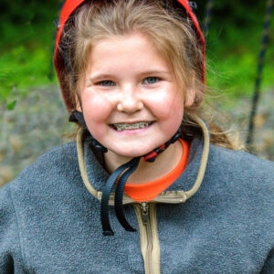 girl in red helmet at Deer Run Winter Day Camp